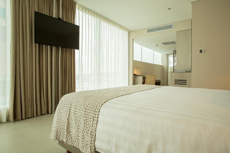 Estelar Cartagena De Indias Hotel Y Centro De Convenciones Exterior photo A bedroom at the hotel